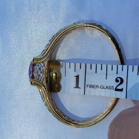 Bangle bracelet with security clasp 925 mark with goldtone. Multi-gemsto…